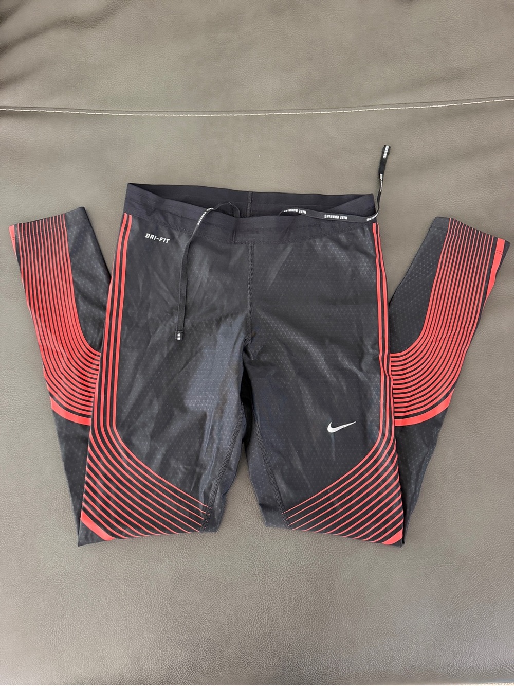 Nike women’s Black Dri-FIT Compression Pants with Red Accents